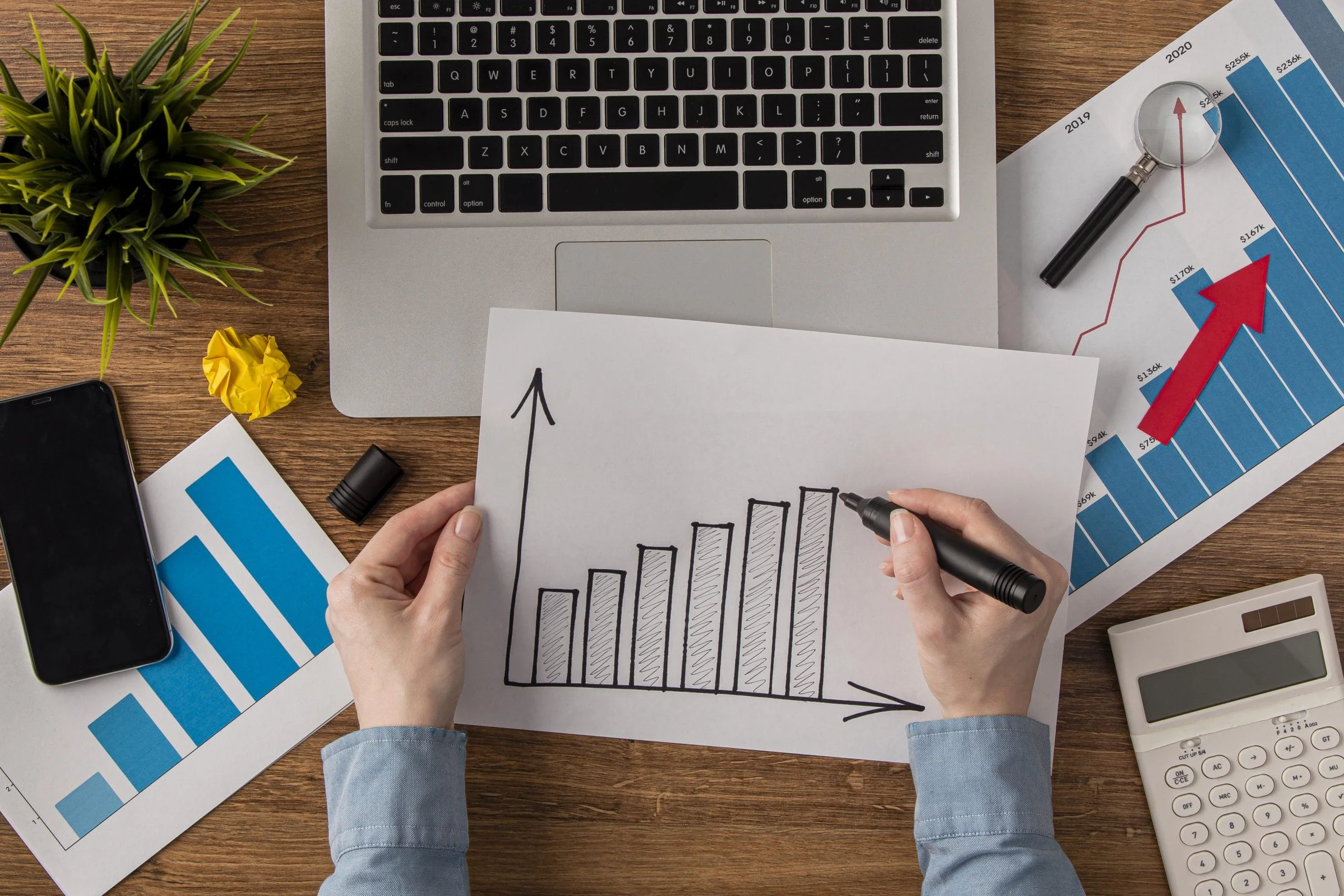 Top View Office Desk With Calculator Growth Chart Scaled 1